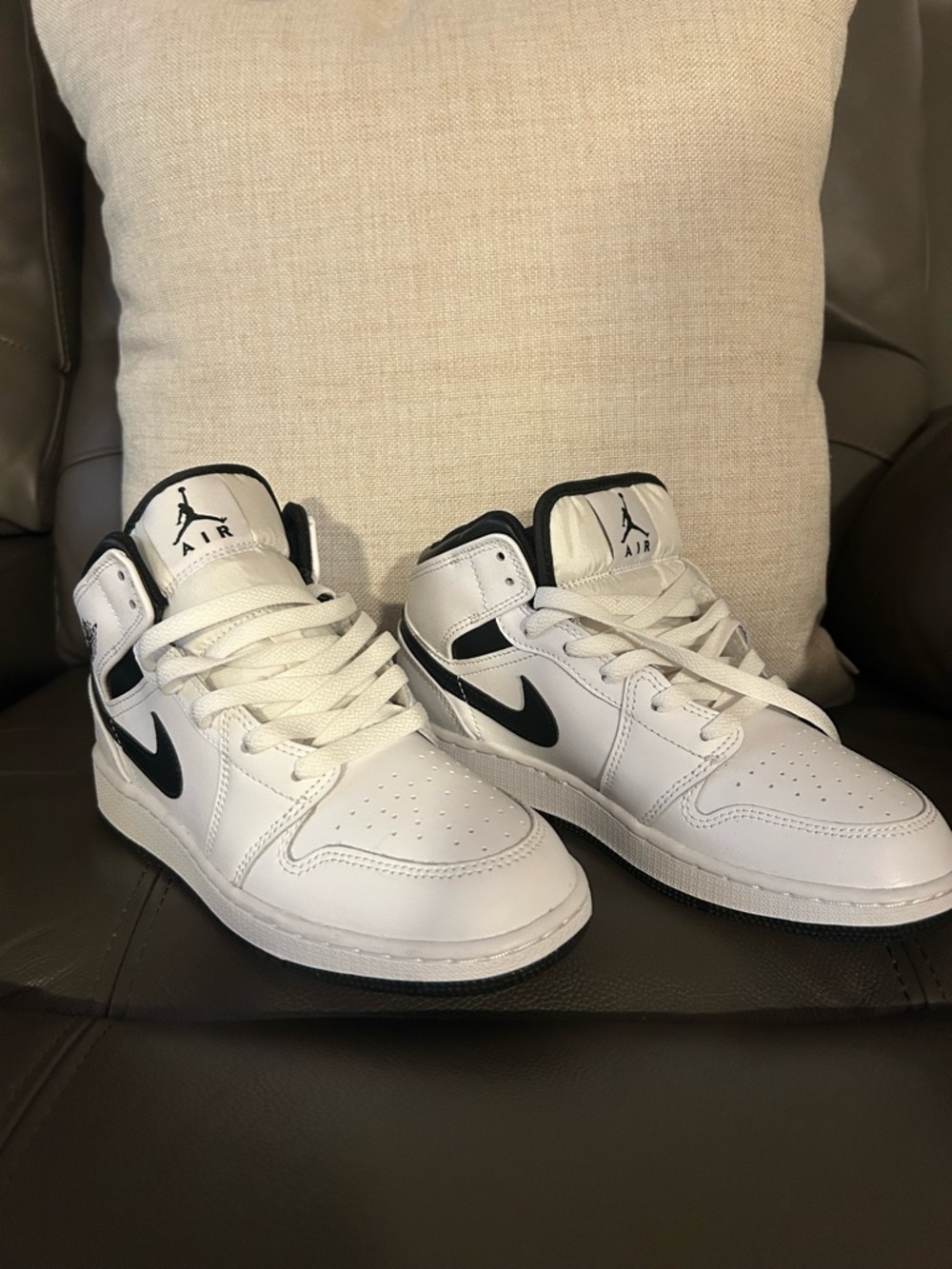 Nike White and Black Mid-Top Sneakers with Swoosh